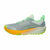 Gray and green running shoe with orange sole on a white background