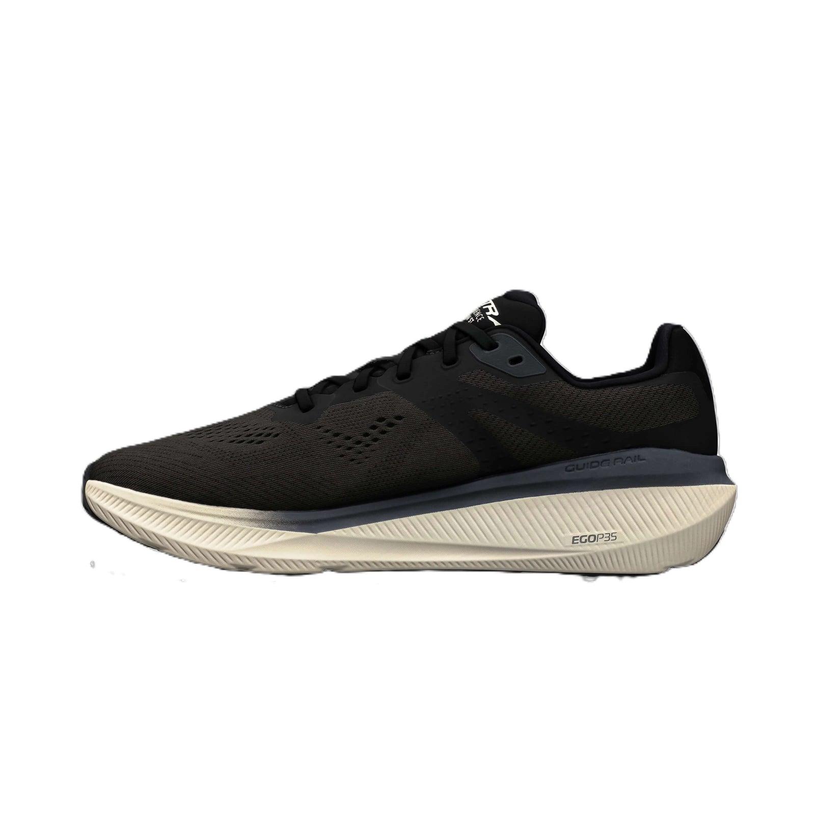 Black trainer with beige sole on a white background