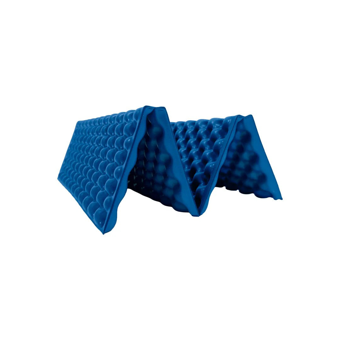 Blue foam mat with a textured surface on a white background