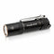 Black Fenix E12 flashlight on a white background
