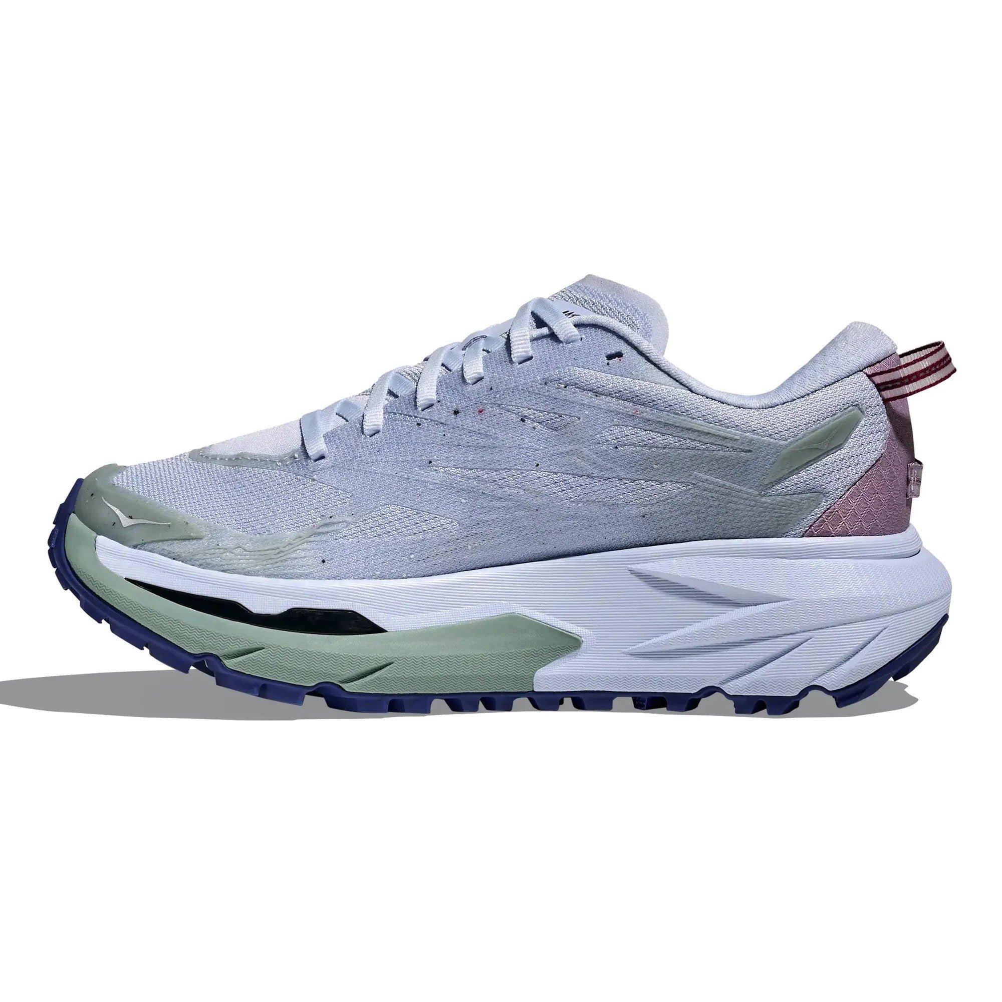 White running shoe with green and purple accents on a white background