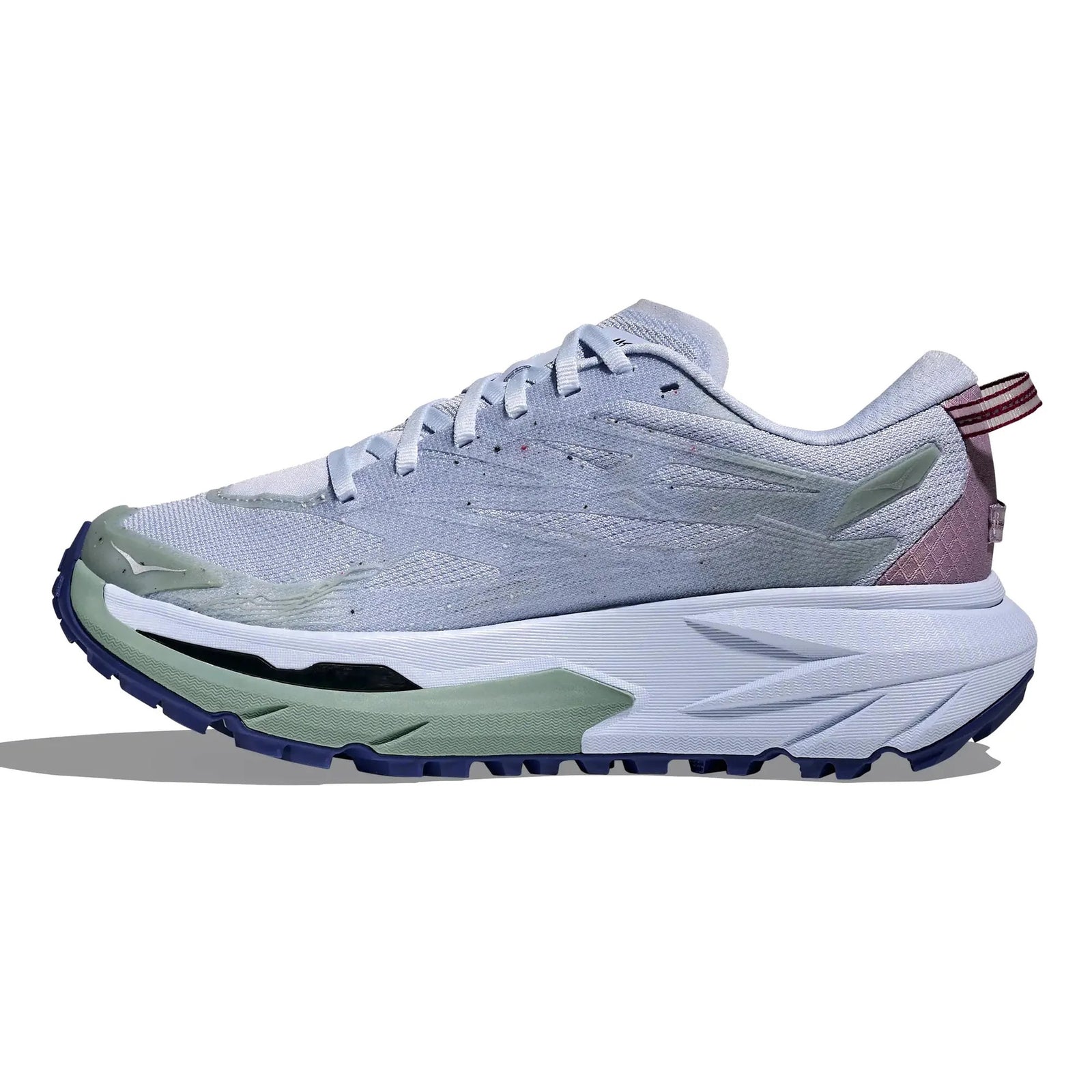 White running shoe with green and purple accents on a white background
