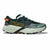Green running shoe with orange accents on a white background