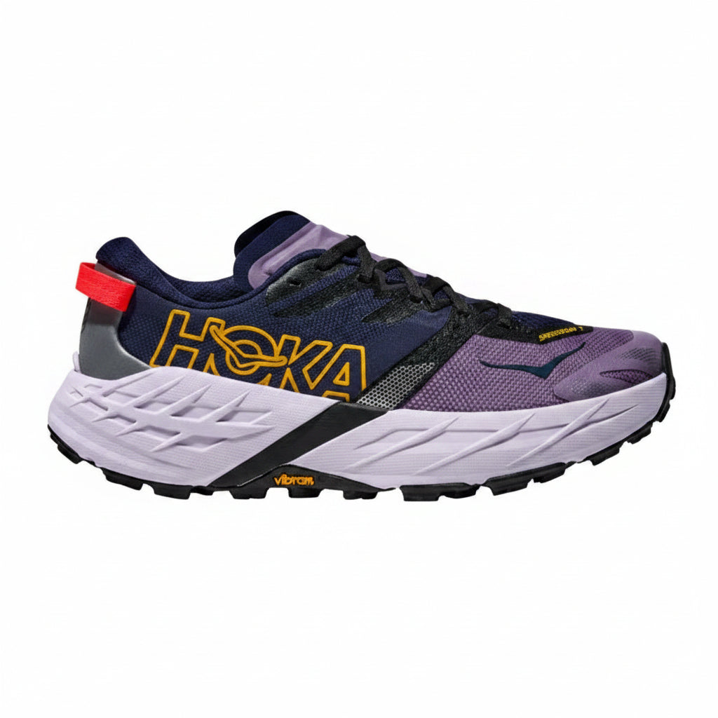 Purple and black running shoe with yellow branding on a white background