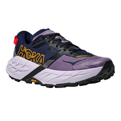 Purple and black running shoe with white sole on a white background