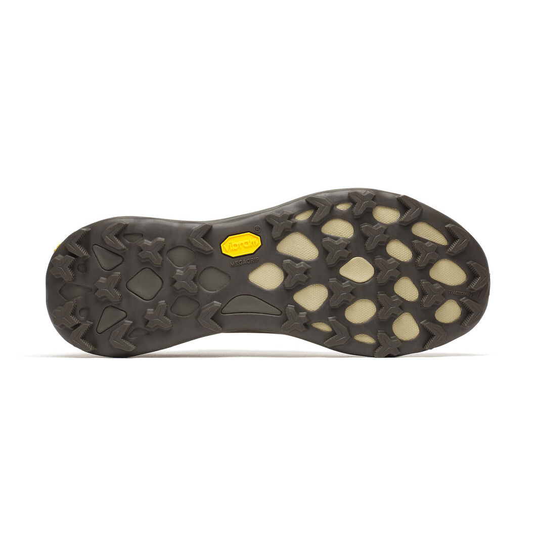 Close-up of a shoe sole with a textured pattern on a white background