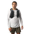 Man wearing a black hydration vest on a white background