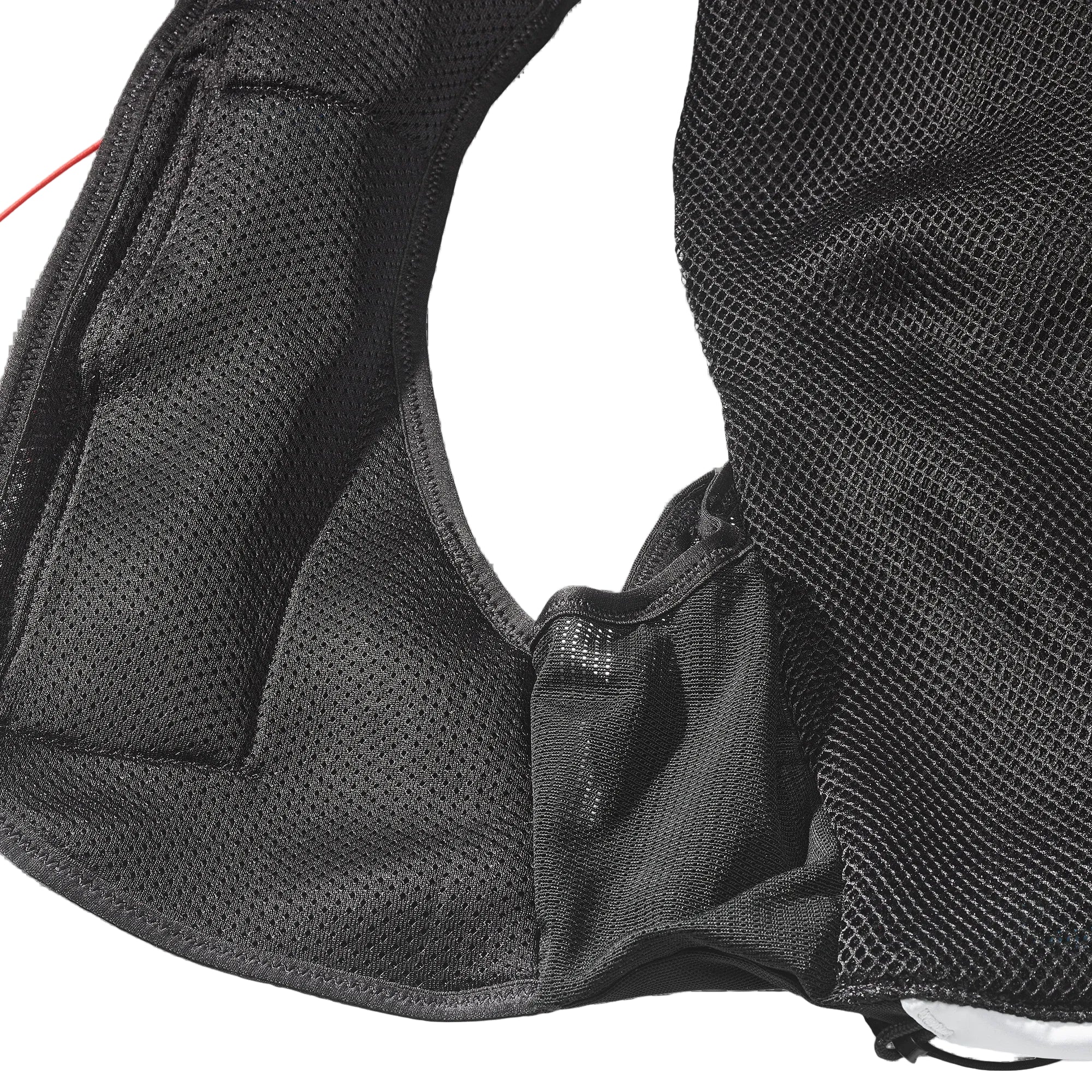 Close-up of a black mesh backpack on a white background