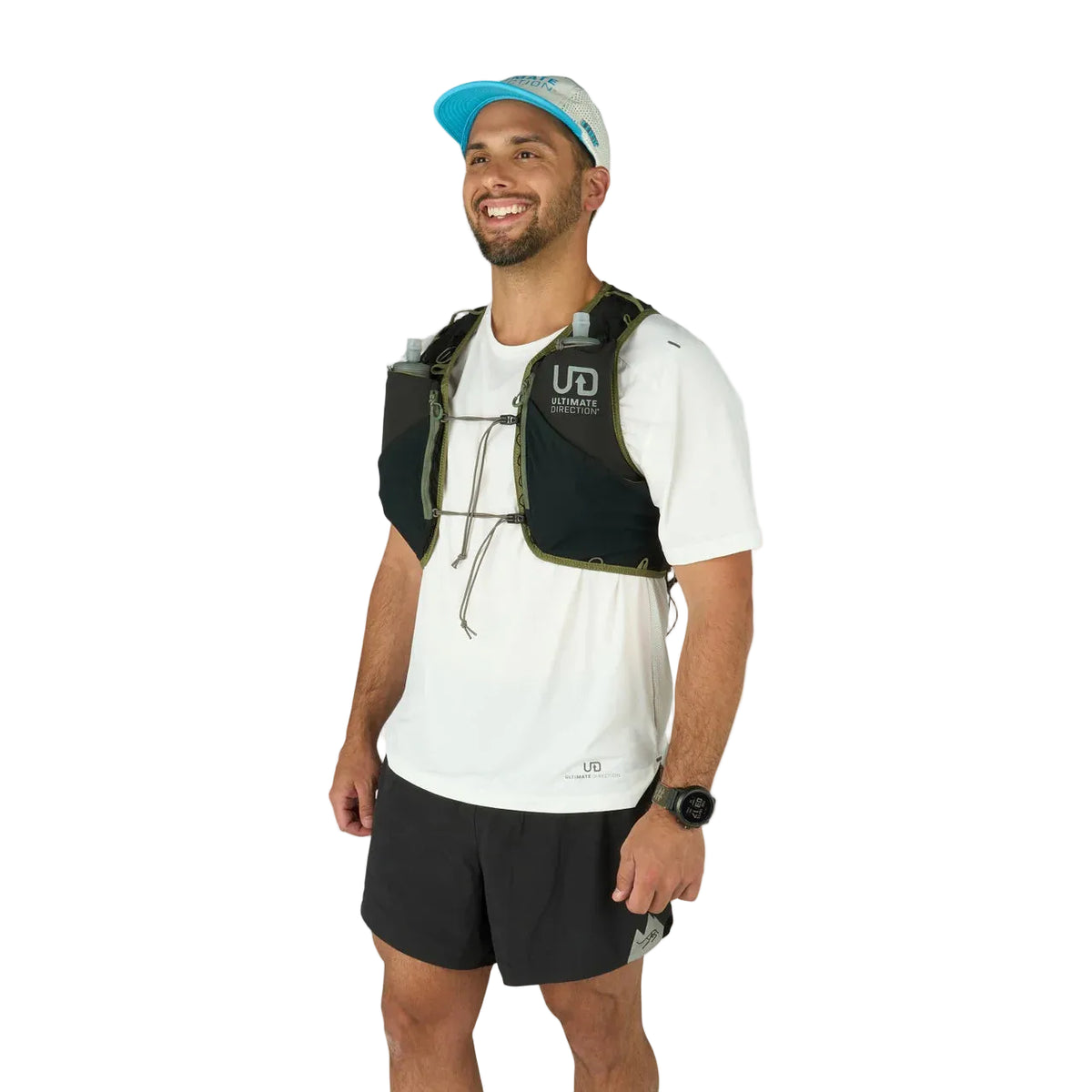 Man wearing a white t-shirt, black shorts, and a hydration vest on a light gray background