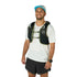 Man wearing a black running vest with water bottles on a white background