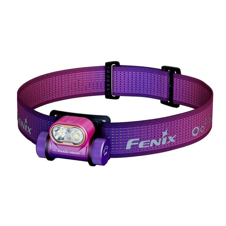 Purple and pink Fenix headlamp on a white background