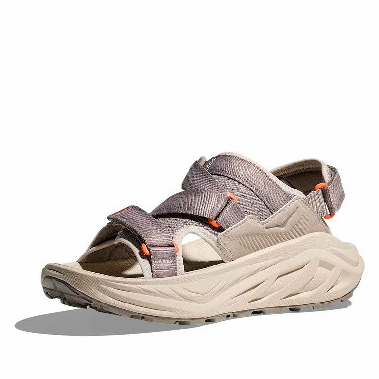 Gray sandal with orange accents on a white background