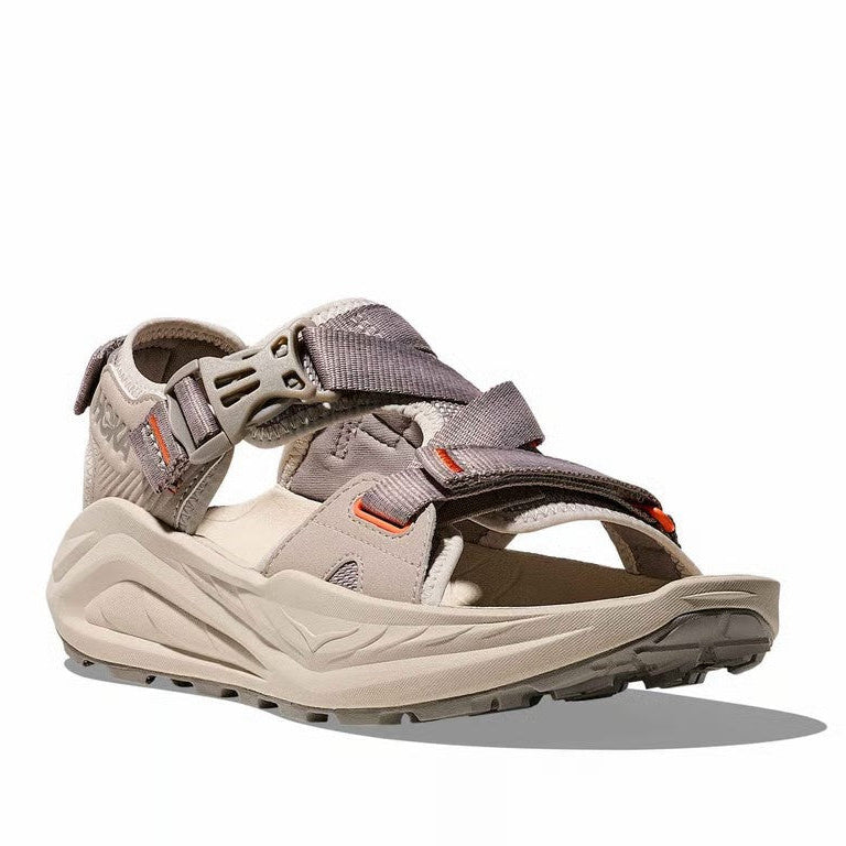 Gray sandal with multiple straps on a white background