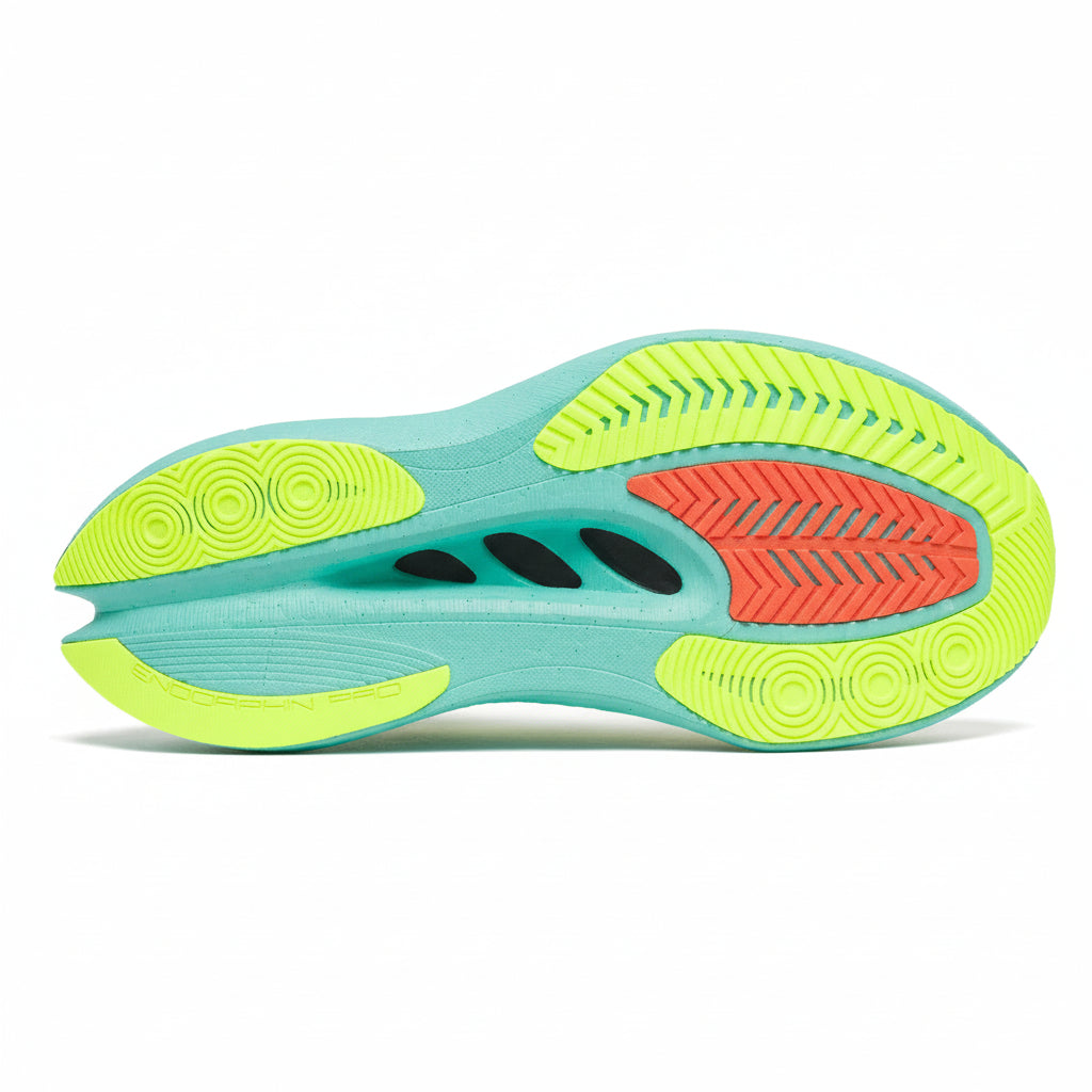 Colorful athletic shoe sole with green, red, and blue design on a white background