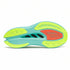 Colorful athletic shoe sole with green, red, and blue design on a white background
